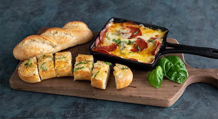 Molten Pepperoni Cheese Dip With Garlic Bread